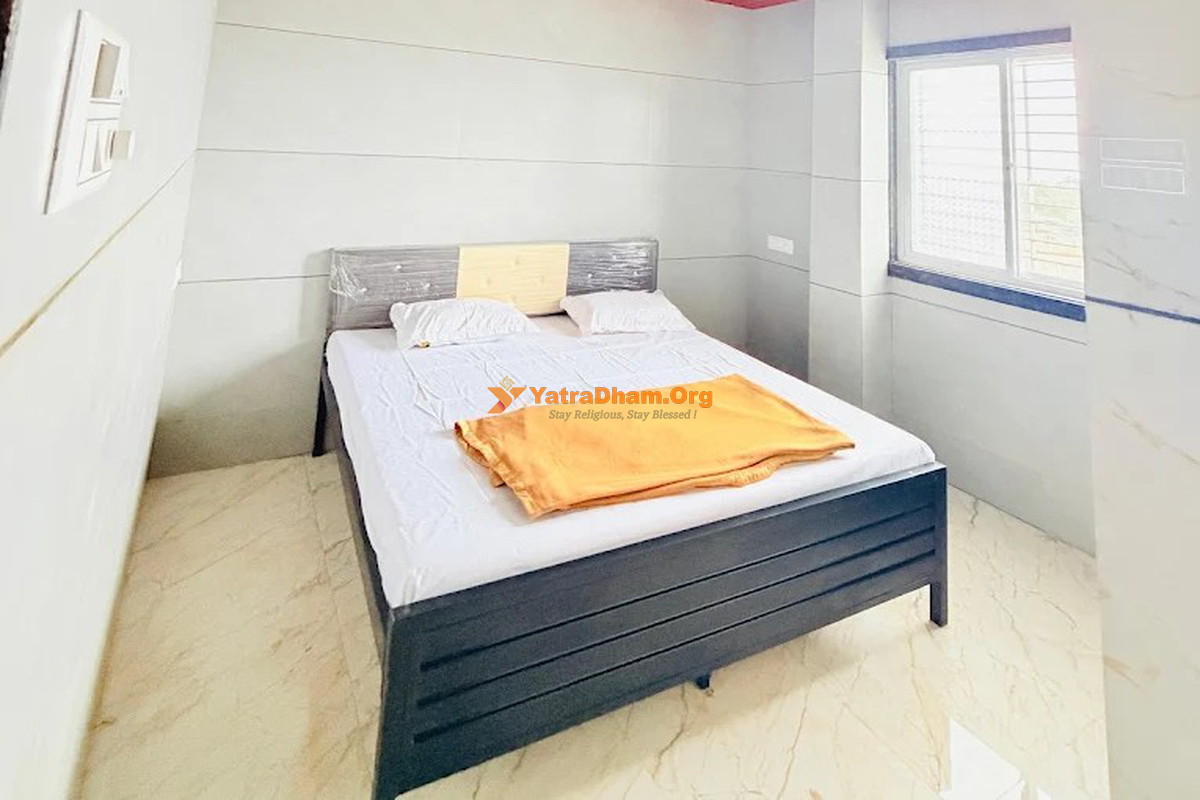Hotel Maa Saheb Lodging and Home Stay Saptashrungi 2 Bed Room View